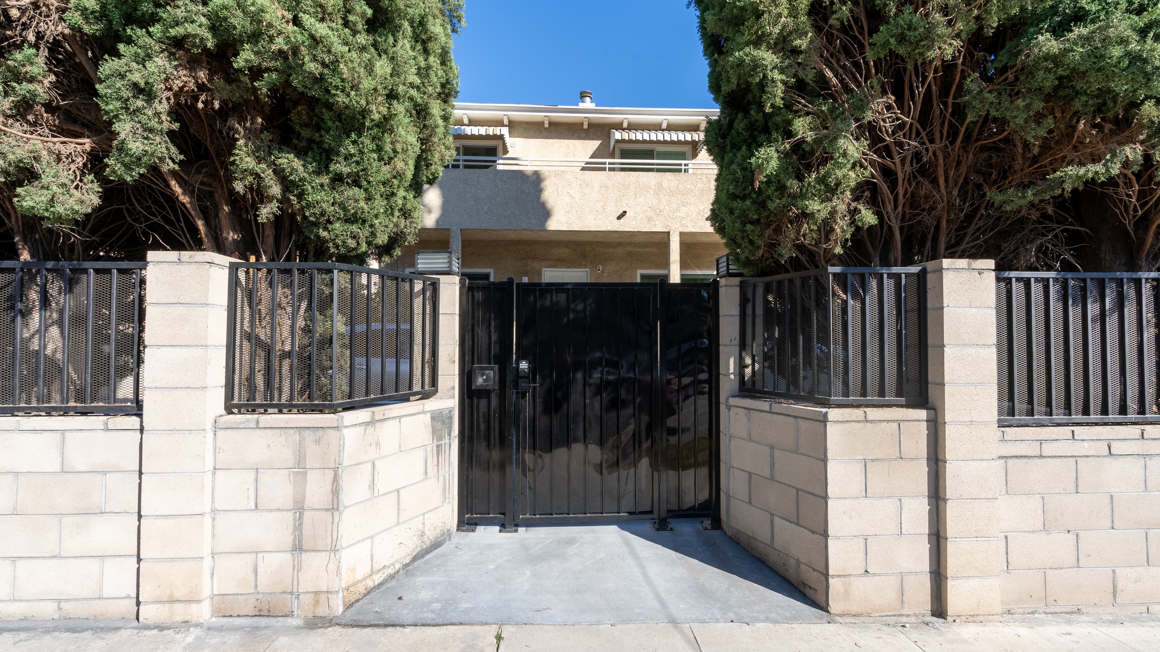 The building's front gate on a quiet Los Feliz street